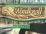 Woodknoll Sign